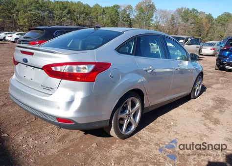 2012 Ford Focus Titanium z USA, uszkodzony, nr VIN 1FAHP3J20CL444584